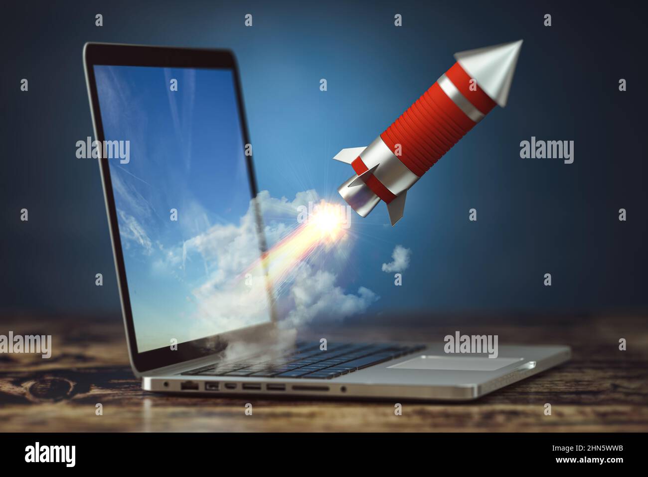 Laptop rocket launching success hi-res stock photography and images - Alamy