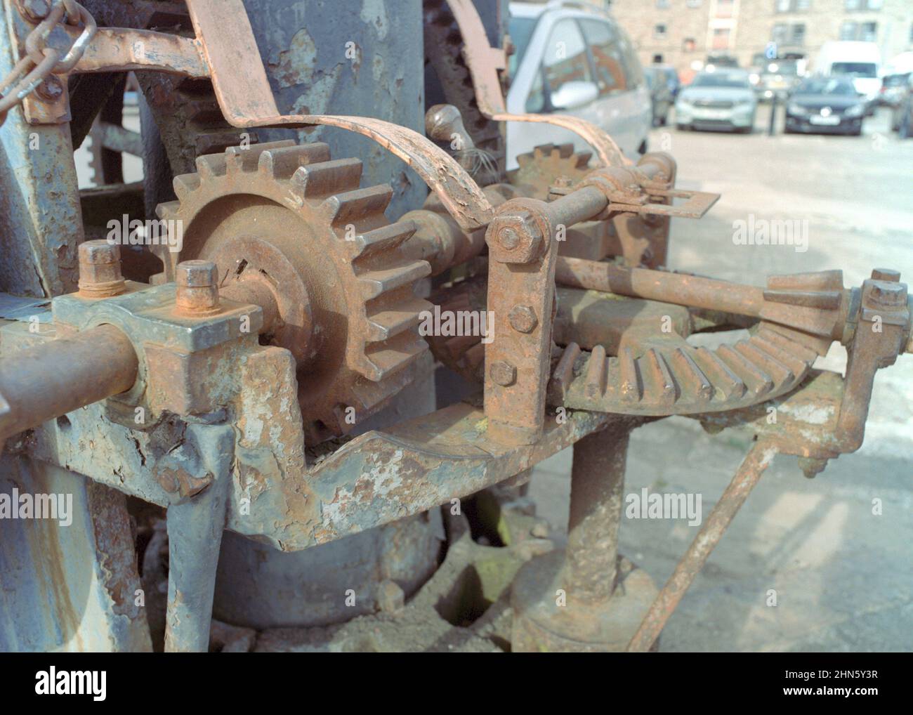 Old rusty gears in Bristol dock area Stock Photo