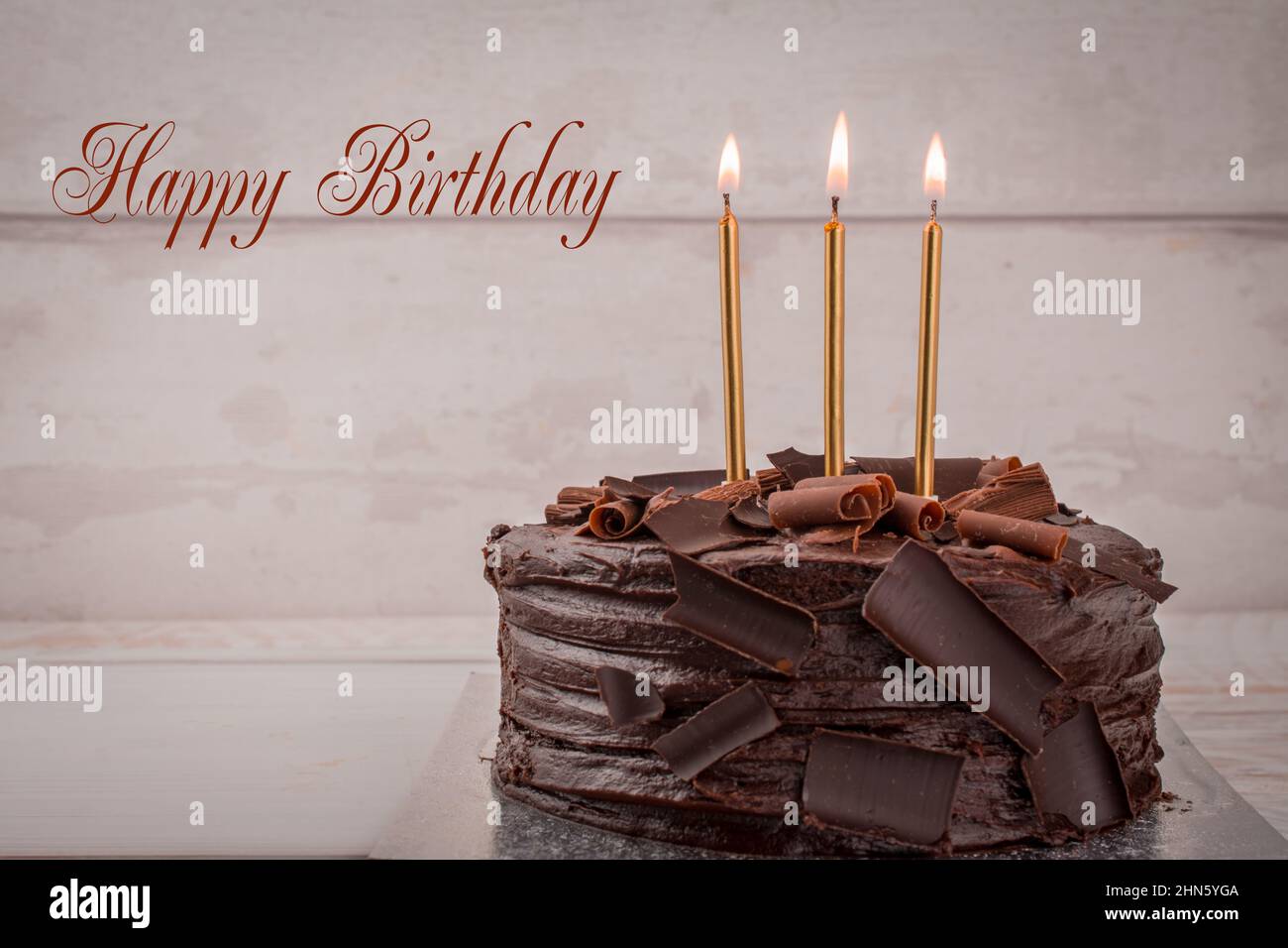 chocolate birthday cake with candles Stock Photo - Alamy