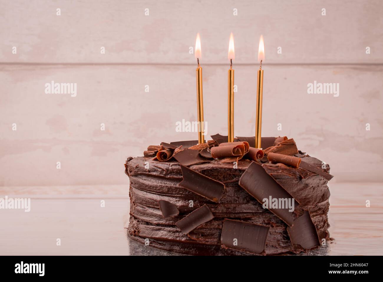 chocolate birthday cake with candles Stock Photo - Alamy