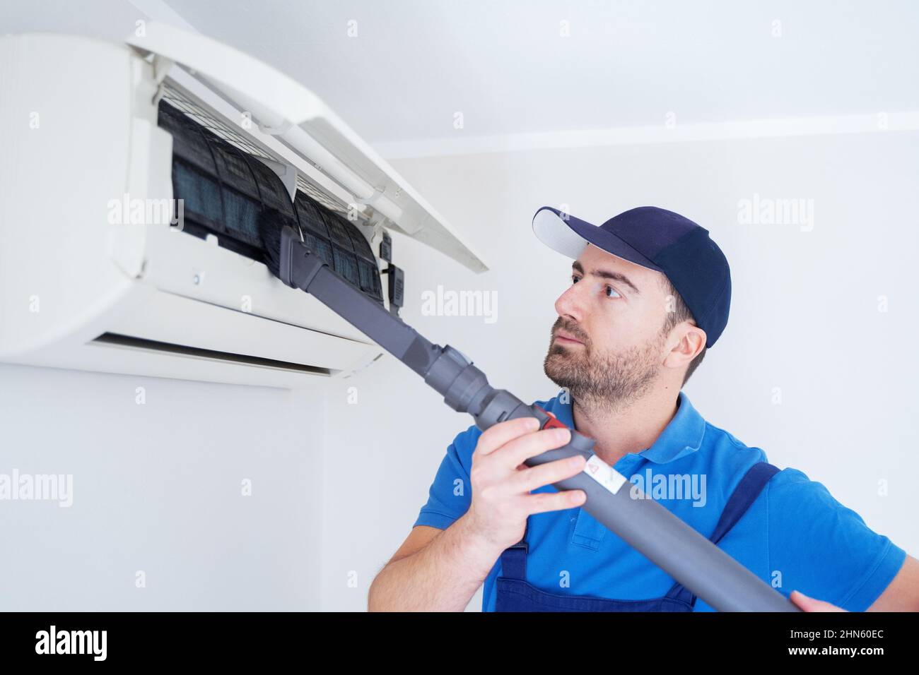 Filter cleaning service maintenance of an air conditioner indoor unit Stock Photo Alamy