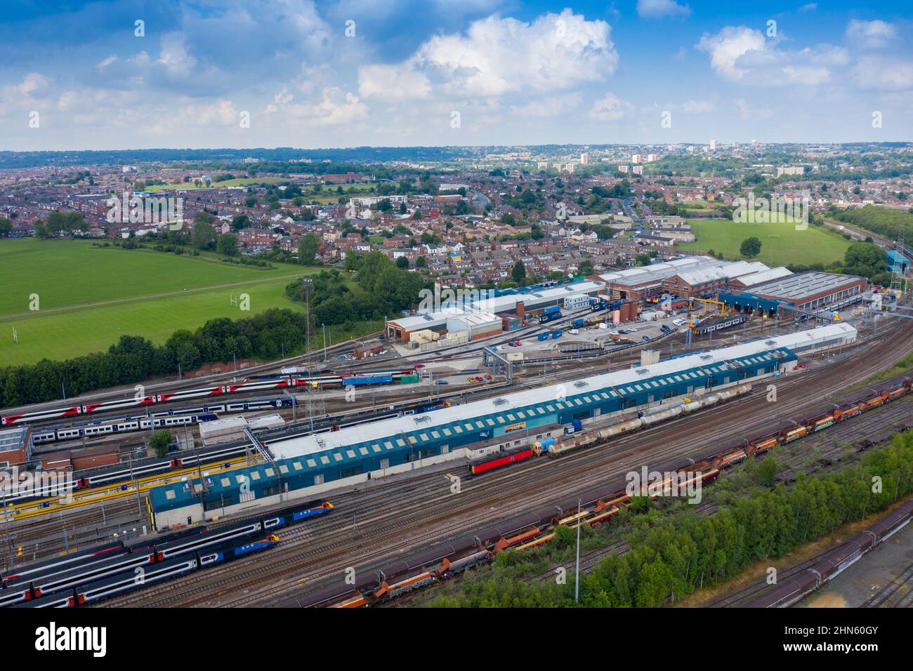 Aerial Photo of a train station works depot with lots of trains in the