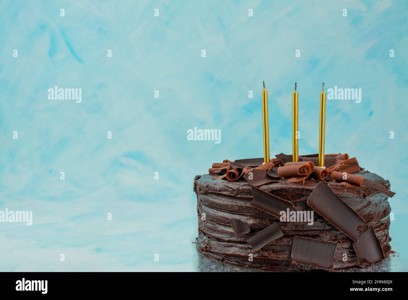 chocolate birthday cake with candles Stock Photo - Alamy