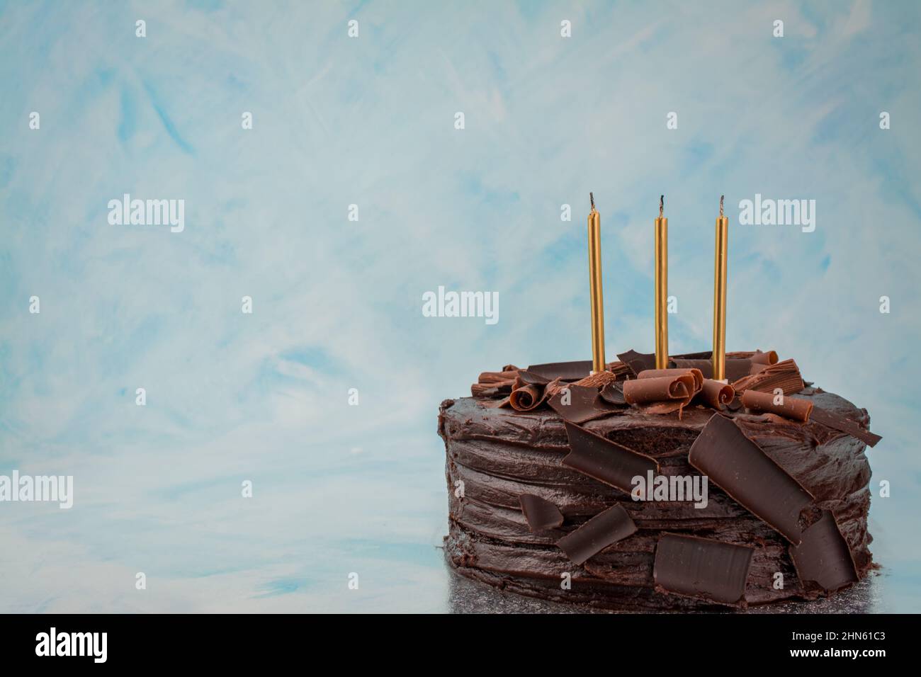 chocolate birthday cake with candles Stock Photo - Alamy