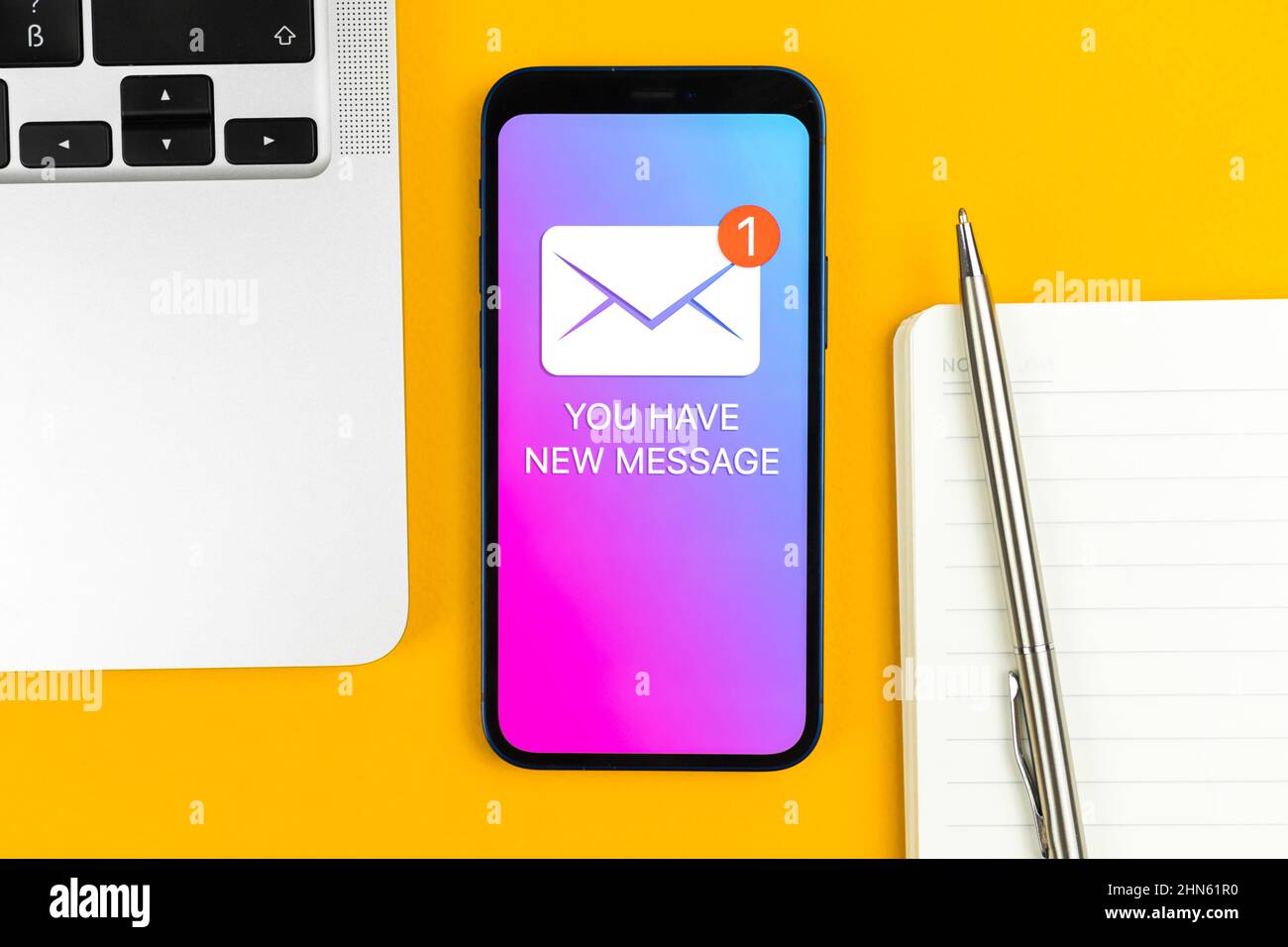 New message icon on mobile phone screen. Business communication ...