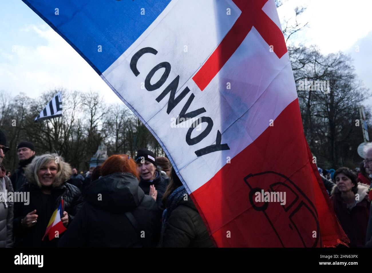 Brussels, Belgium. 14th Feb, 2022. Protesters shout slogans during an unauthorised demonstration of Freedom Convoy against coronavirus disease (COVID-19) in Brussels, Belgium on February 14, 2022. Credit: ALEXANDROS MICHAILIDIS/Alamy Live News Stock Photo