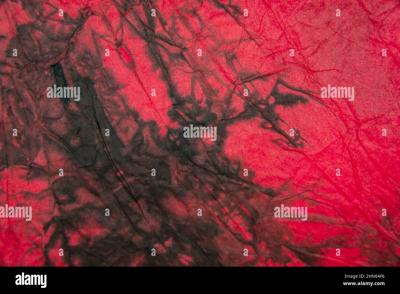 Red multicolore crumpled paper decorative background texture Stock Photo