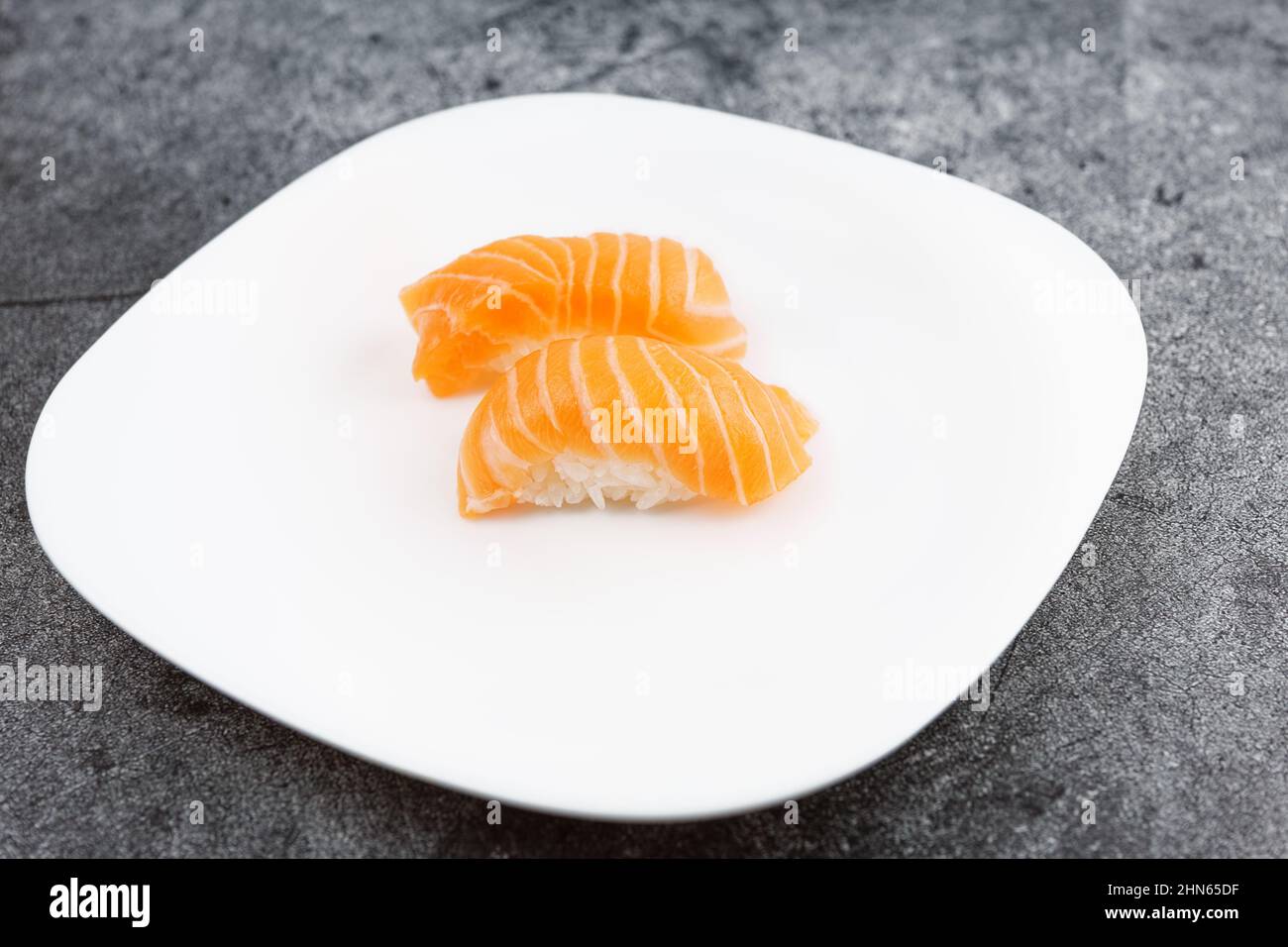 Salmon sushi shot on light gray background Stock Photo