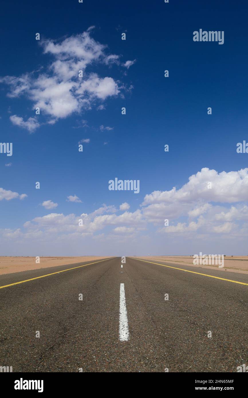 Desert Highway empty Asphalt road , travel concept picture - Blue sky Stock Photo