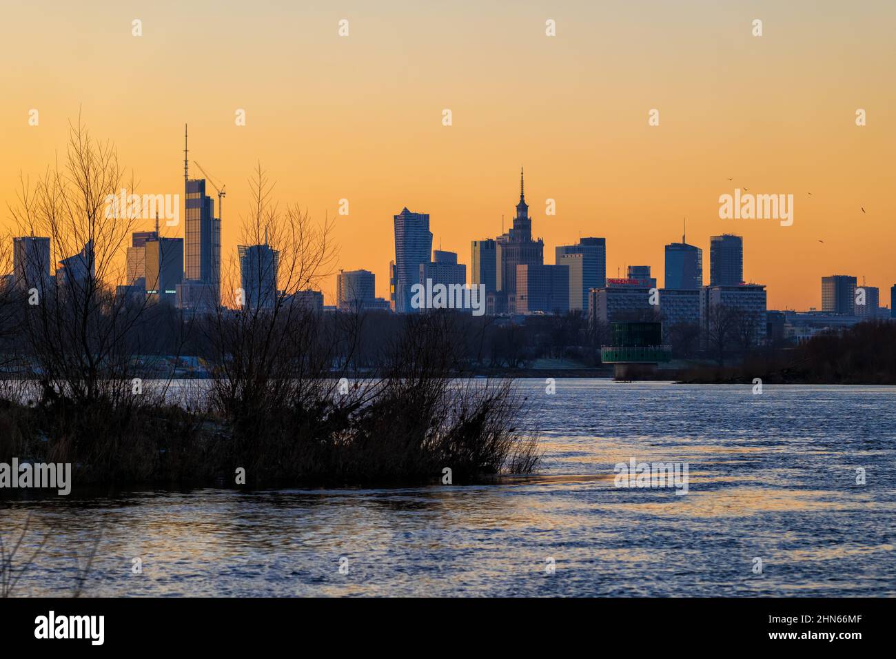 Warsaw city skyline with sunset sky, capital of Poland downtown river ...