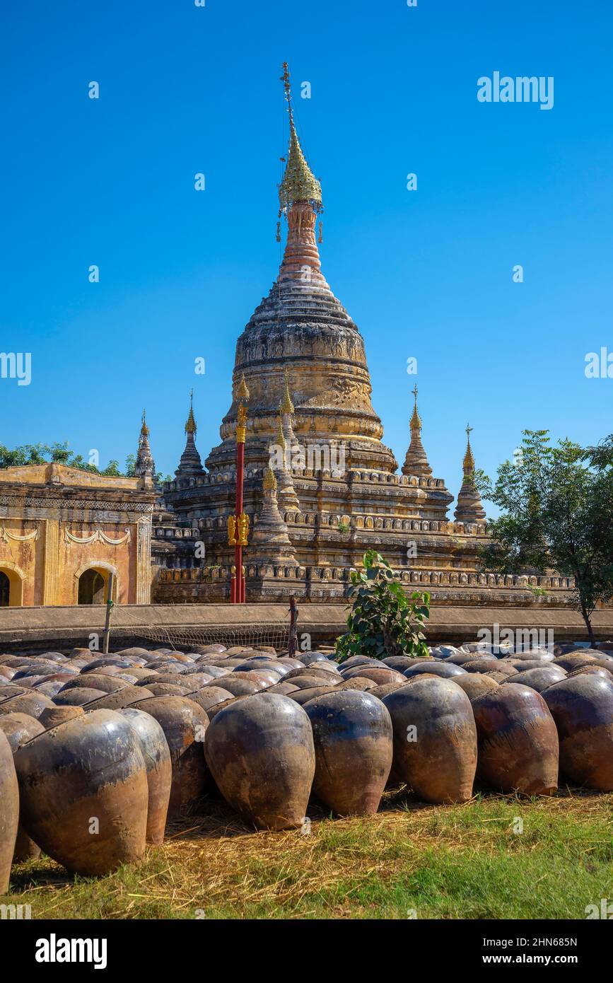 Large clay pots stacked at the ancient Buddhist temple of Hsu Taung Pyi. Old Bagan, Myanmar (Burma) Stock Photo
