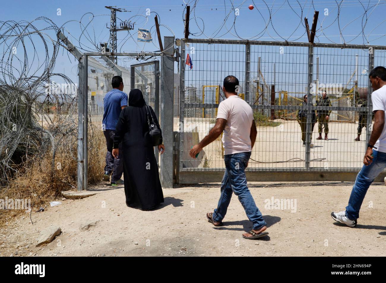 Every morning tens of thousands of Palestinian workers cross Israeli military checkpoints on their way to their workplaces © Antonio Ciufo Stock Photo