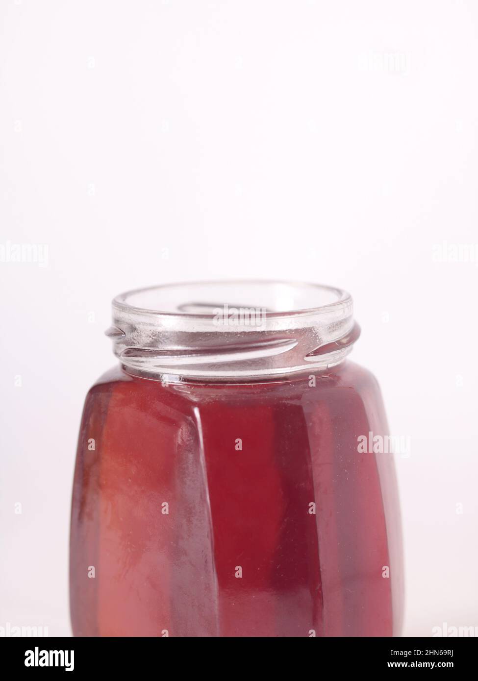 Honey in a jar, white background Stock Photo