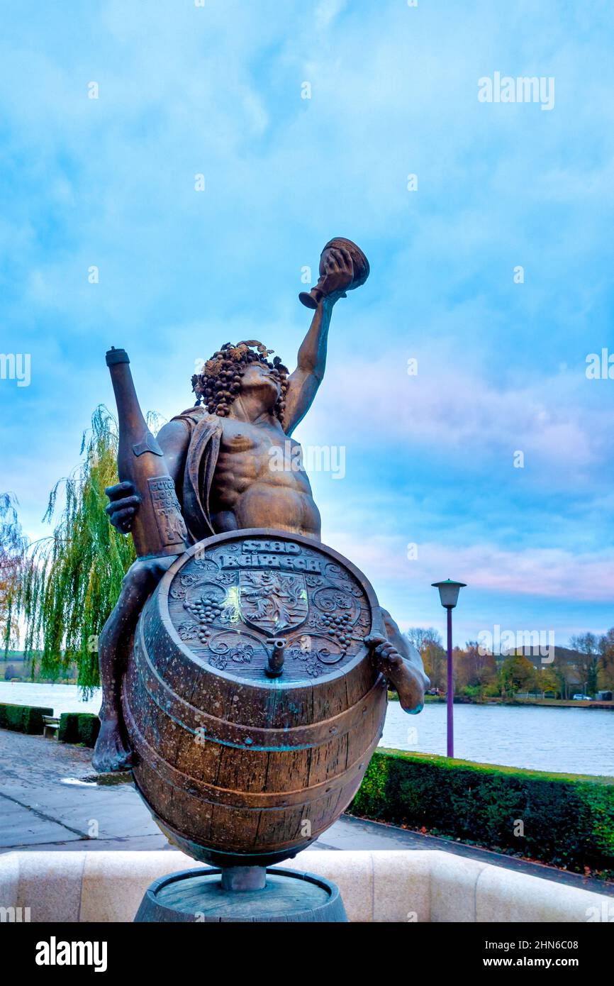 Bacchus fountain by artist Will Lofy at sunset, Remich, Luxembourg Stock Photo