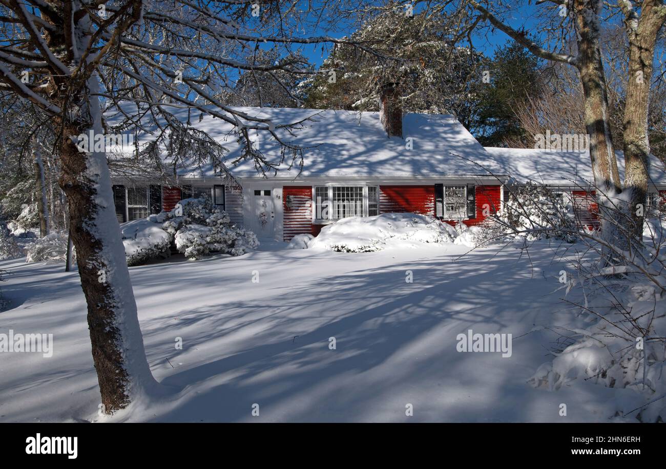 A snow blasted home on Cape Cod, Massachusetts in the Town of Dennis. Stock Photo