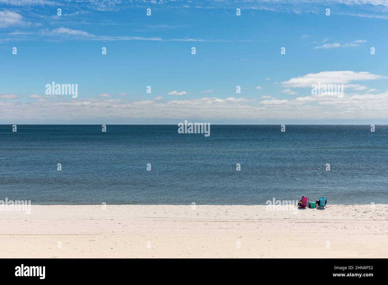 Gulf Shores, AL March 3, 2021 Couple enjoying the beach at Gulf Shores. Gulf Shores and