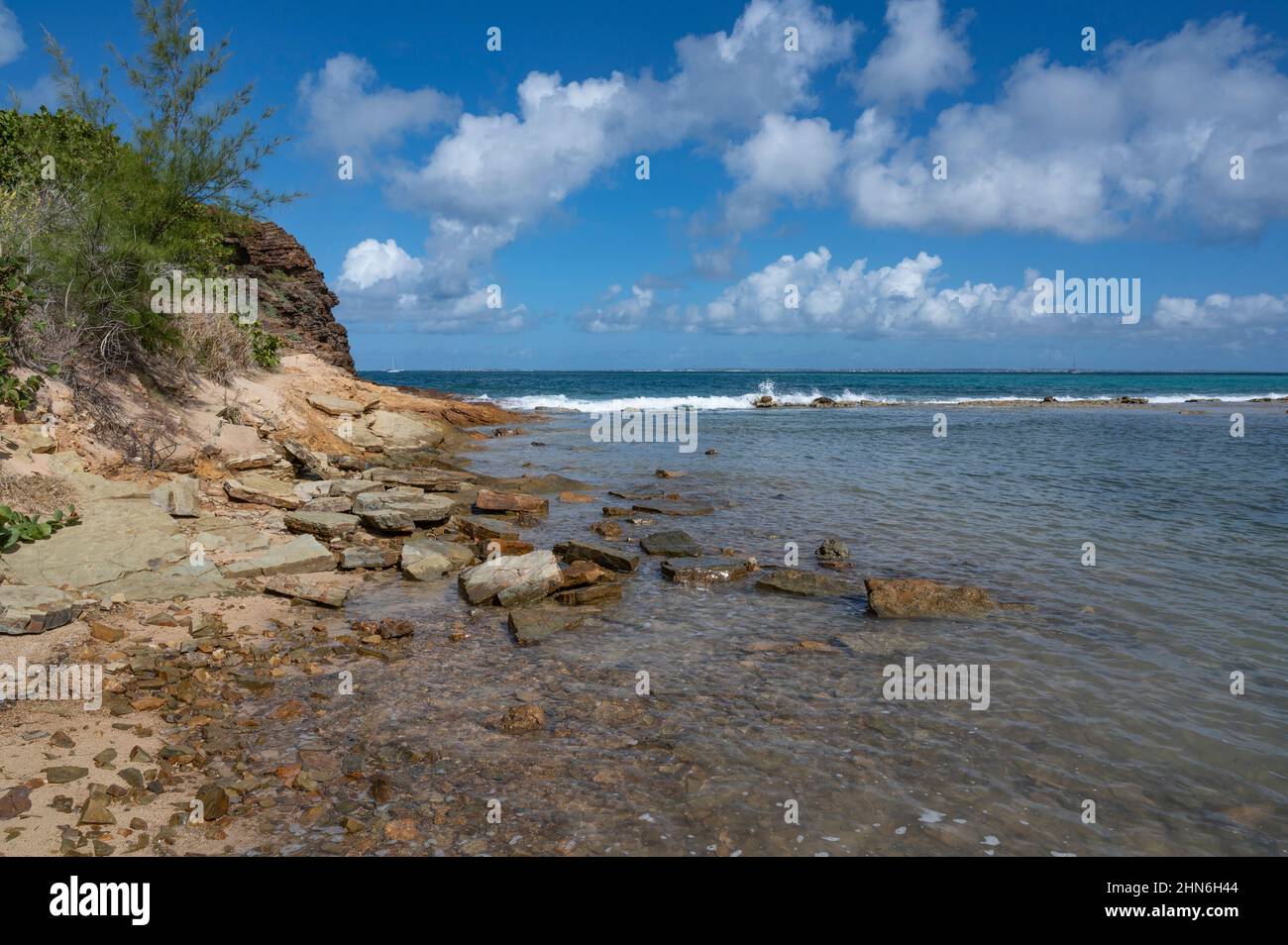 The coast of Saint-Martin at the Trou David, an eroded blowhole in the cliffs of the Caribean island Stock Photo