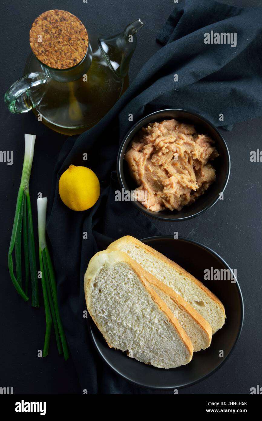 Ingredients to make greek fish roe dip ,known as taramosalata on black background Stock Photo