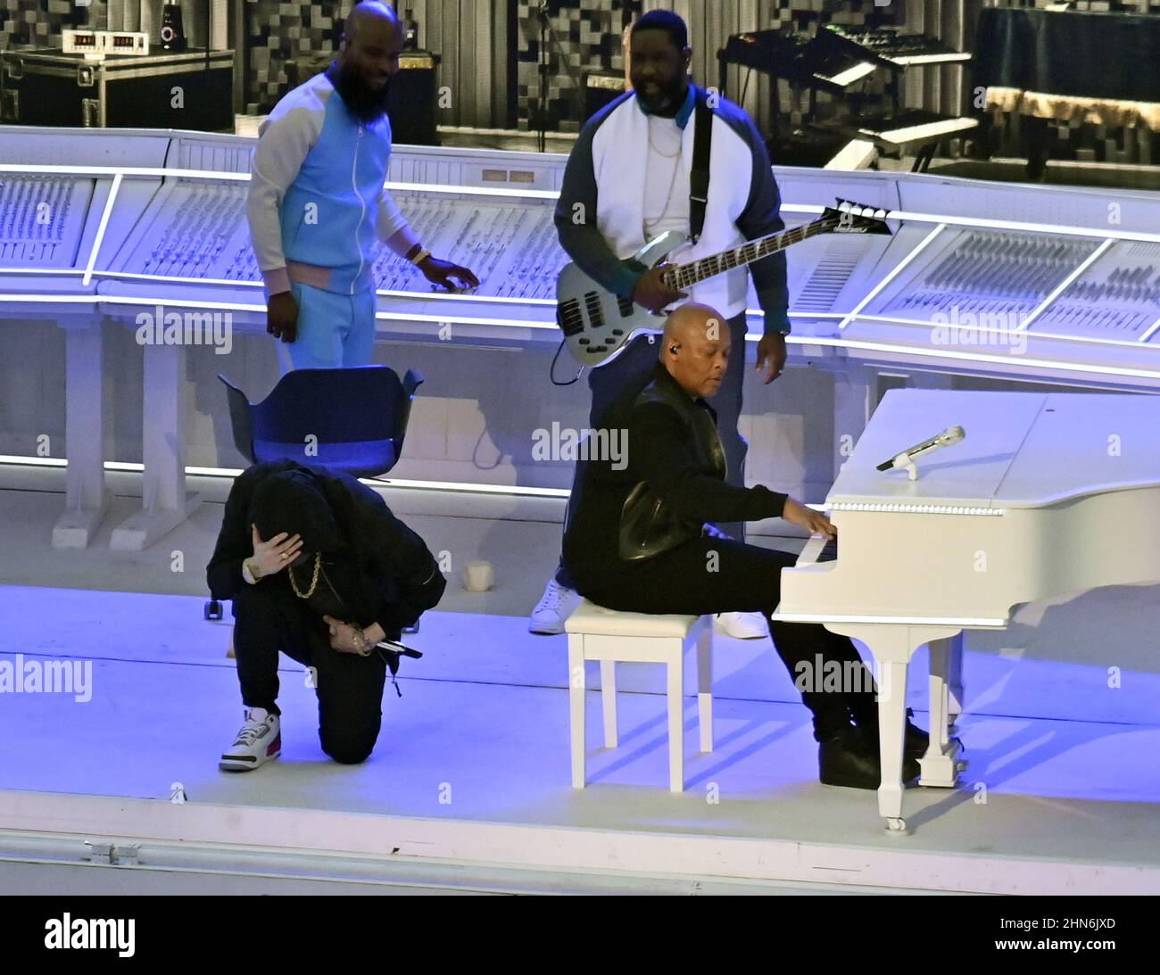 Inglewood, United States. 14th Feb, 2022. Rap superstar Eminem takes a knee during his Super Bowl LVI halftime performance in support of Black athletes and a tribute to Colin Kaepernick at SoFi Stadium in Inglewood, California on Sunday, February 13, 2022. According to a league spokesman, the NFL did not tell Eminem he couldn't knee during the halftime show. Photo by Jim Ruymen/UPI Credit: UPI/Alamy Live News Stock Photo
