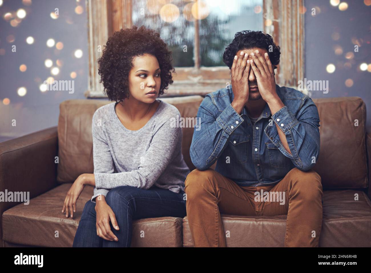 Every marriage has its bad days.... Shot of a couple having relationship problems at home. Stock Photo