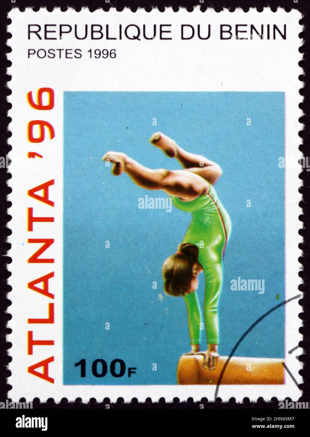 BENIN - CIRCA 1996: a stamp printed in Benin shows Gymnastics, 1996 Summer Olympic Games, Atlanta, circa 1996 Stock Photo