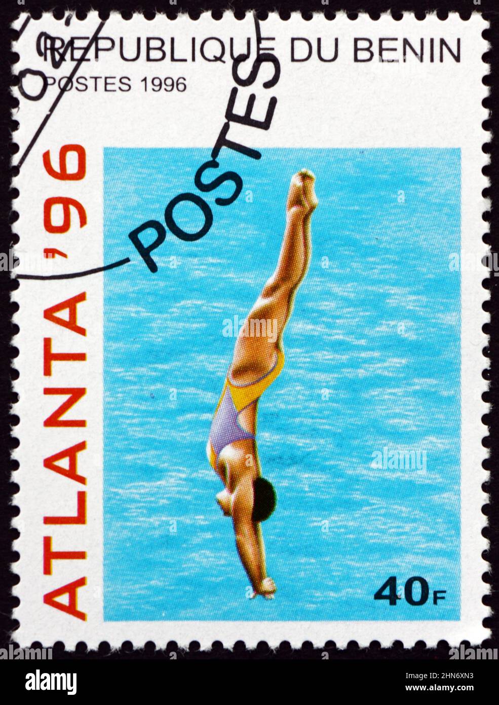 BENIN - CIRCA 1996: a stamp printed in Benin shows Diving, 1996 Summer Olympic Games, Atlanta, circa 1996 Stock Photo