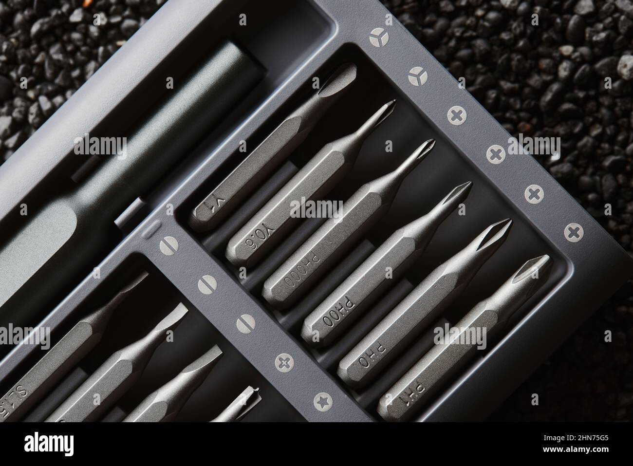 Screwdriver tips different shapes and sizes close up. Manual metal mini