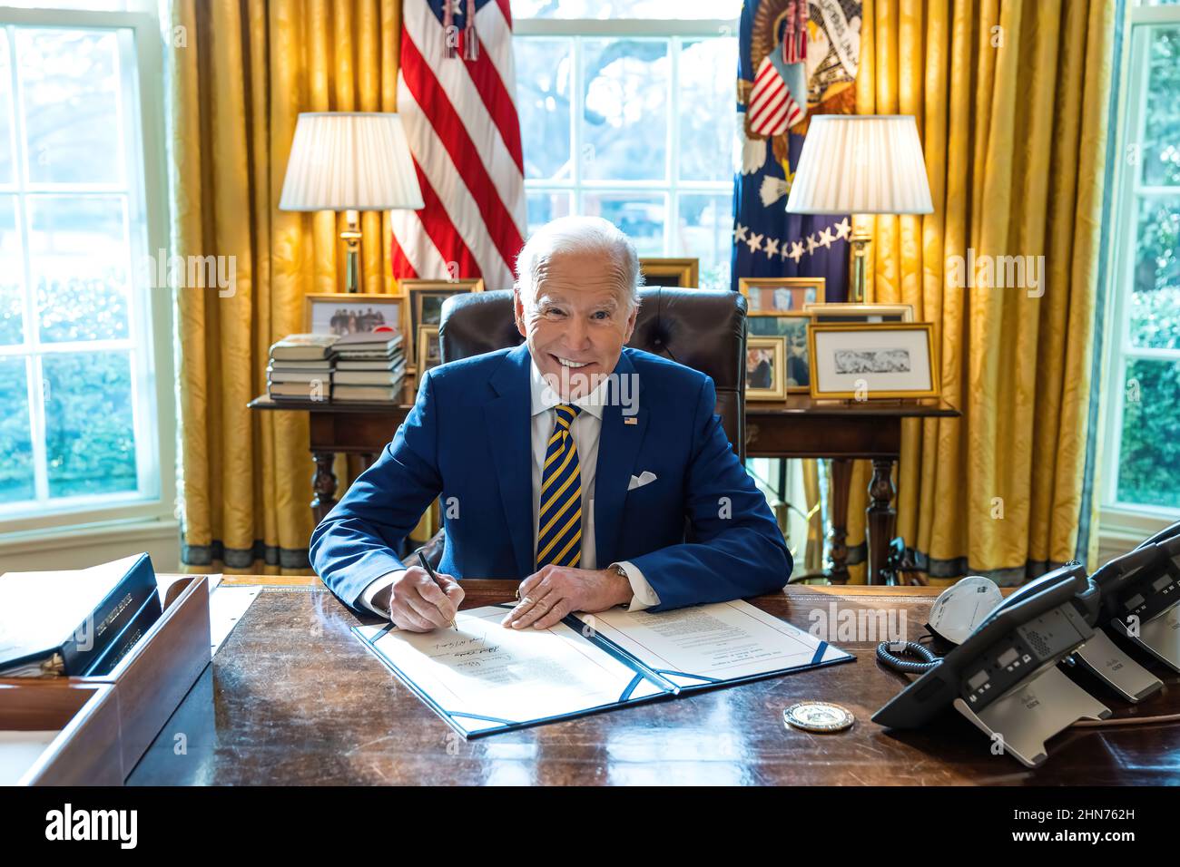 President joe Biden at work in the Oval Office of the White House Stock