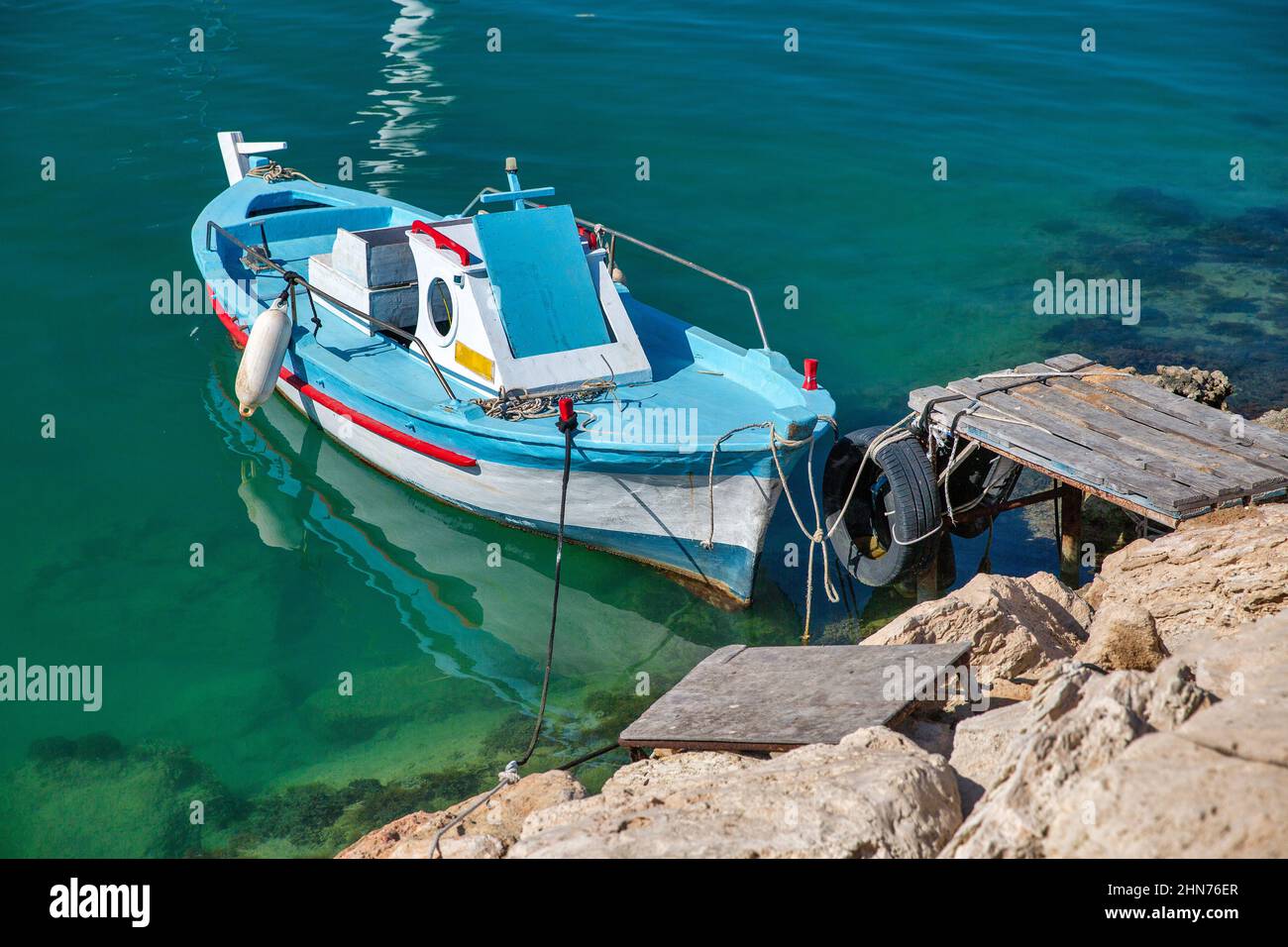 Fishing boat closeup in seaport. Ayia Napa is a tourist resort at the far eastern end of the southern coast of Cyprus. Stock Photo