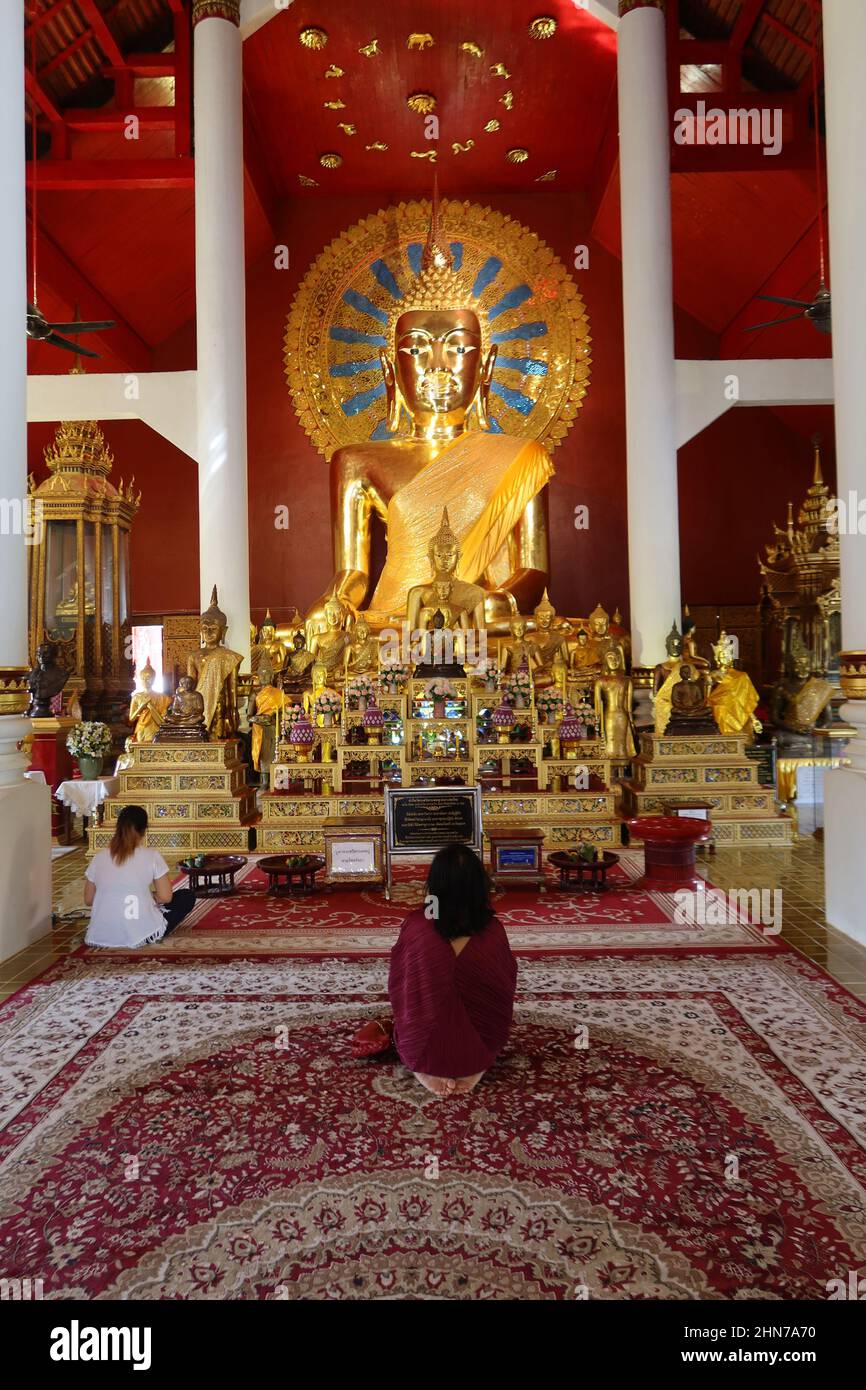 Women in meditation at Wat Phra That. Doi Suthep, Chiang Mai, Thailand Stock Photo