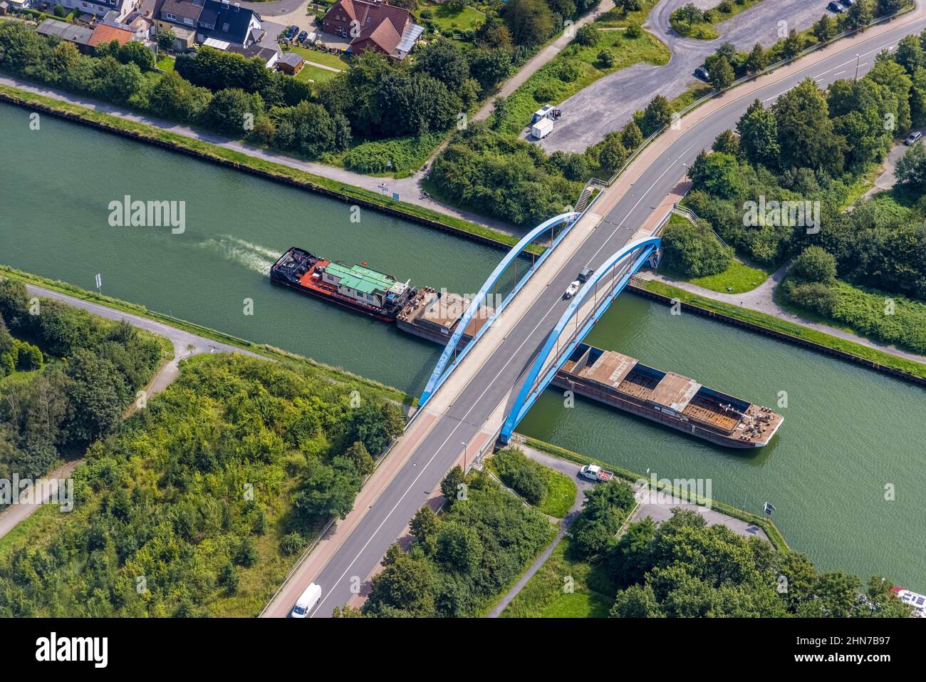 Aerial view, cargo ship on the Datteln-Hamm canal at the Werner Straße bridge in Rünthe, Bergkamen, Ruhr area, North Rhine-Westphalia, Germany, inland Stock Photo