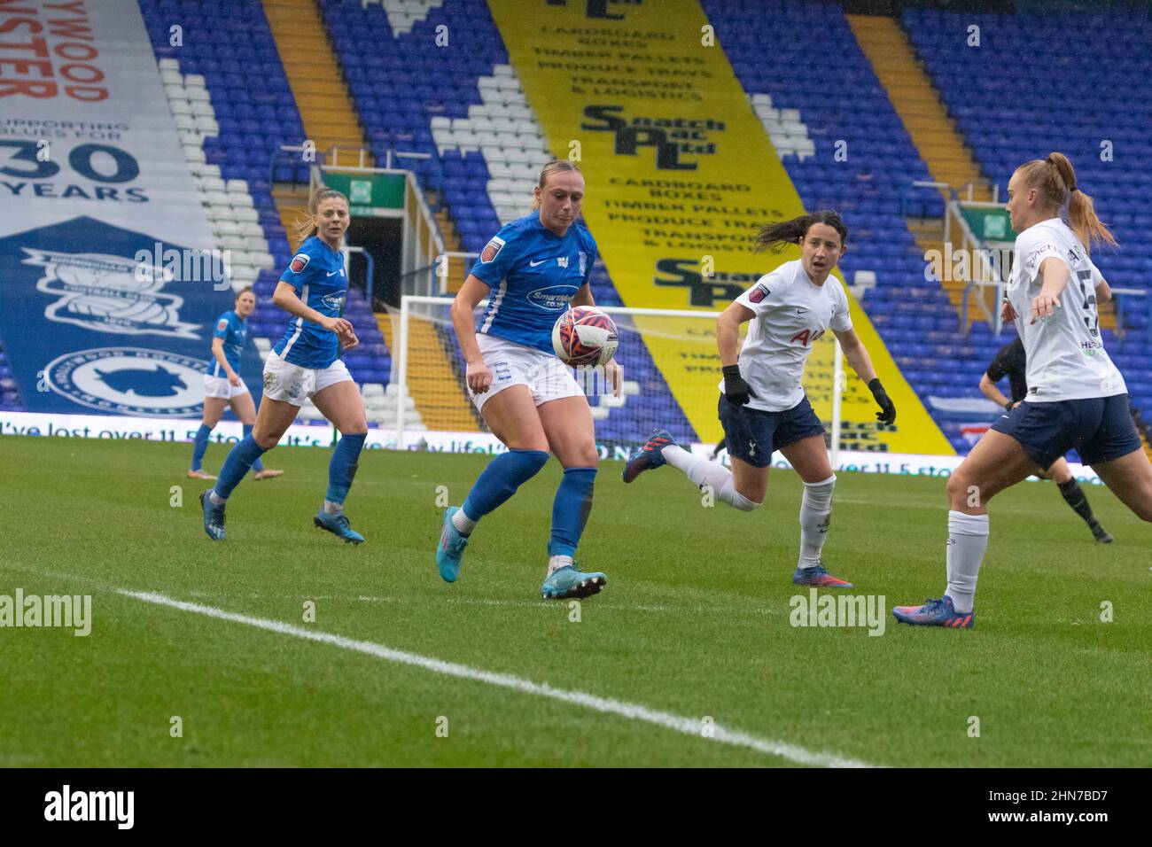 Libby Smith of Birmingham City flicking the ball past the Tottenham Hotspur defenders Stock Photo