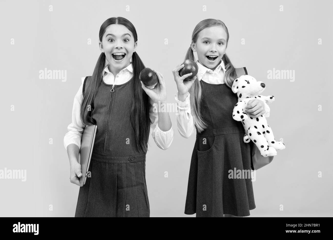 Healthy teeth, yummy eat. Happy kids hold apples. Dental health education. Teeth are always in style Stock Photo