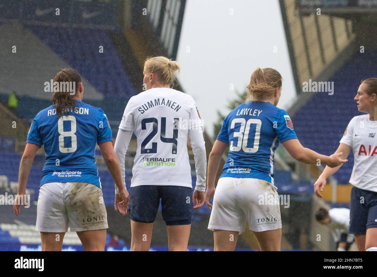 Lisa Robertson, Gemma Lawley of Birmingham City and Eveliina Summanen of Tottenham Hotspur waiting for the ball Stock Photo