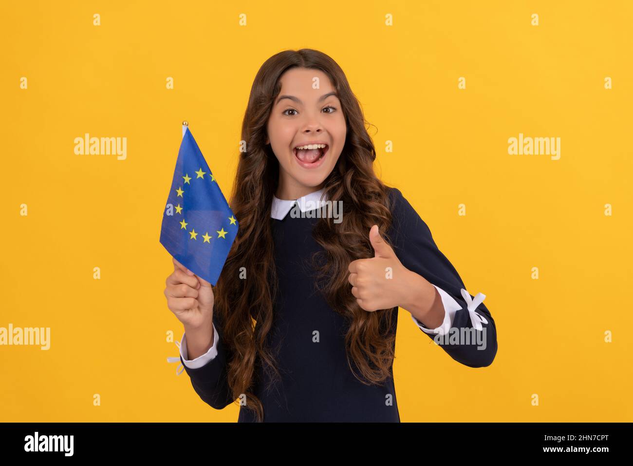 eurozone vacation. education in foreign school. thumb up. happy child Stock Photo