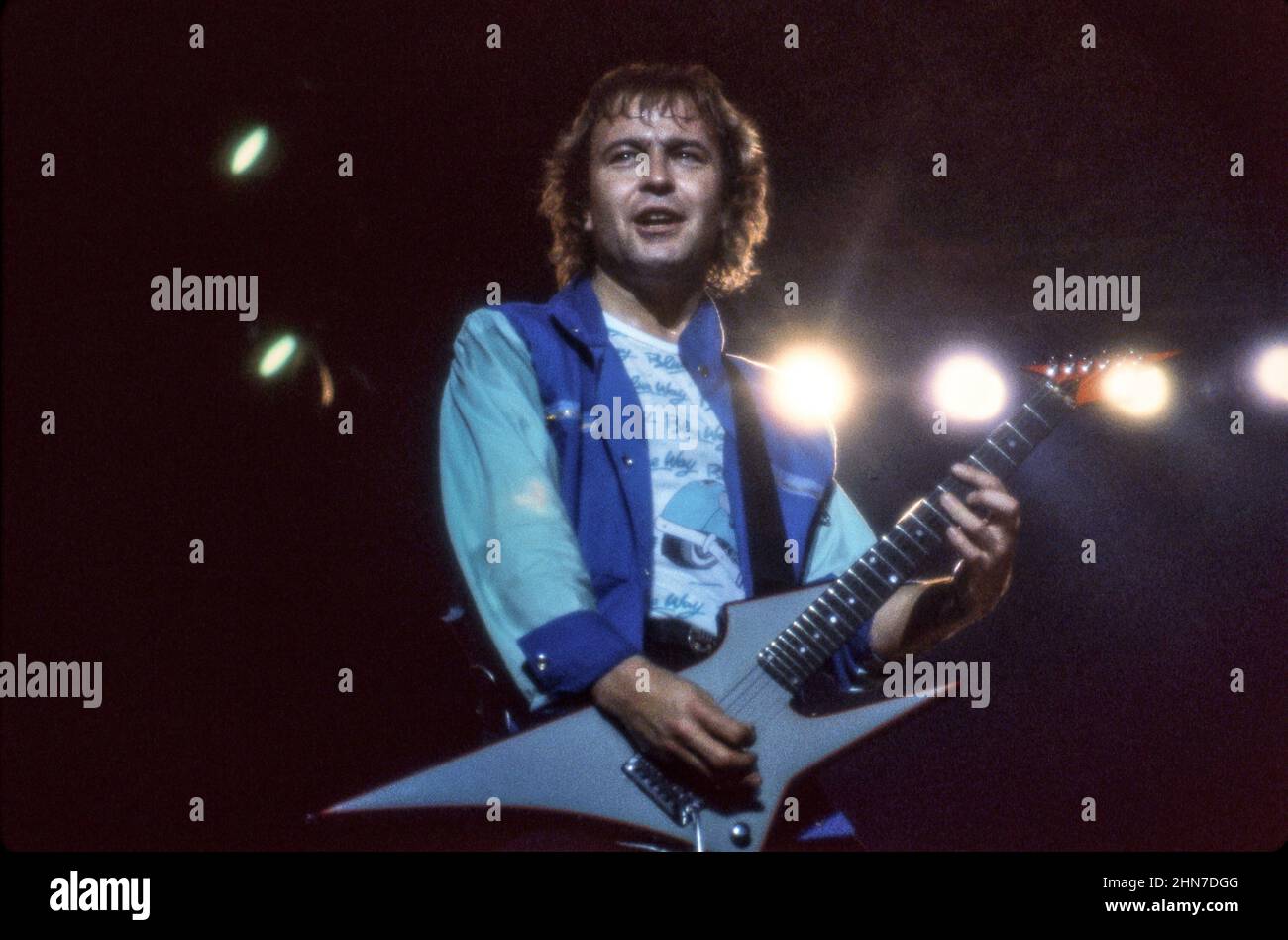 Guitarist Mick Jones of Anglo-American band Foreigner performing at Wembley Arena, London in 1985. Stock Photo