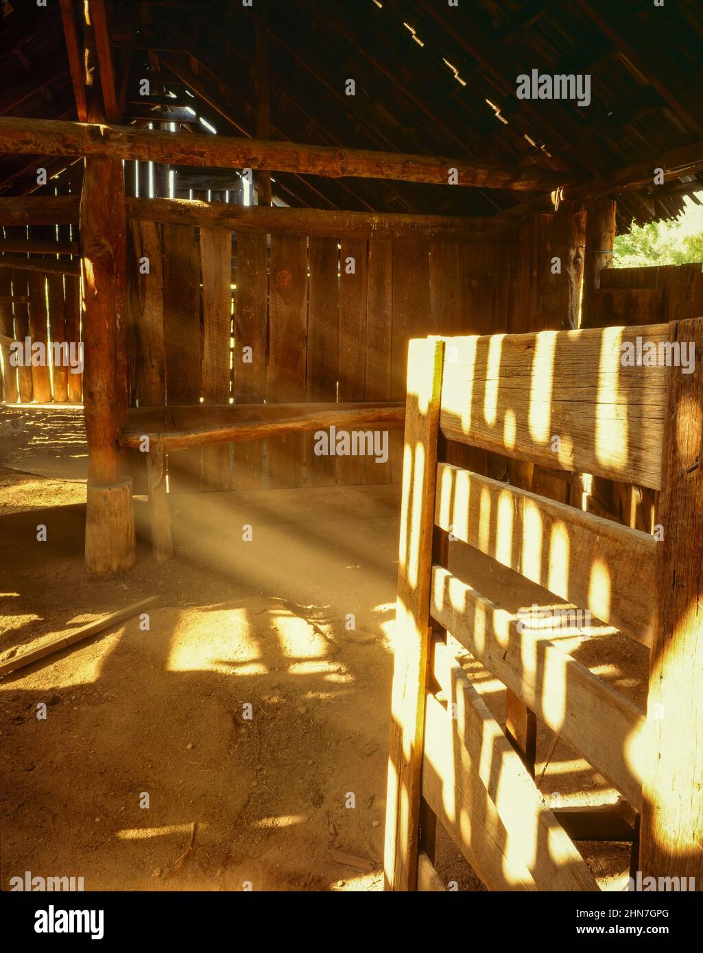 Chiricahua Mounatins  AZ / JUNE Rays of sunlight streak the interior of the stable at historic Camp Rucker. Stock Photo