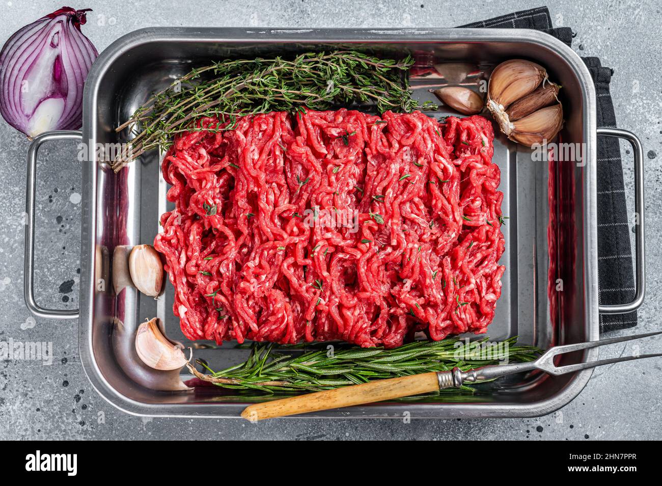 Fresh Raw Ground, Mince, minced beef and lamb meat. Gray background