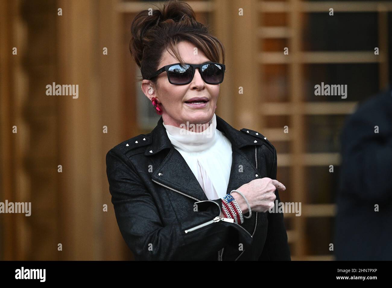 New York, USA. 14th Feb, 2022. Former Alaska Gov. Sarah Palin is seen leaving the U.S. District Court, in New York, NY, February 14, 2022. U.S. District Judge Jed Rakoff ruled that he will dismiss a libel lawsuit that Palin filed against The New York Times while the jury was still deliberating; Palin is claiming The New York Times damaged her reputation with an editorial falsely linking her campaign rhetoric to a mass shooting. (Photo by Anthony Behar/Sipa USA) Credit: Sipa USA/Alamy Live News Stock Photo