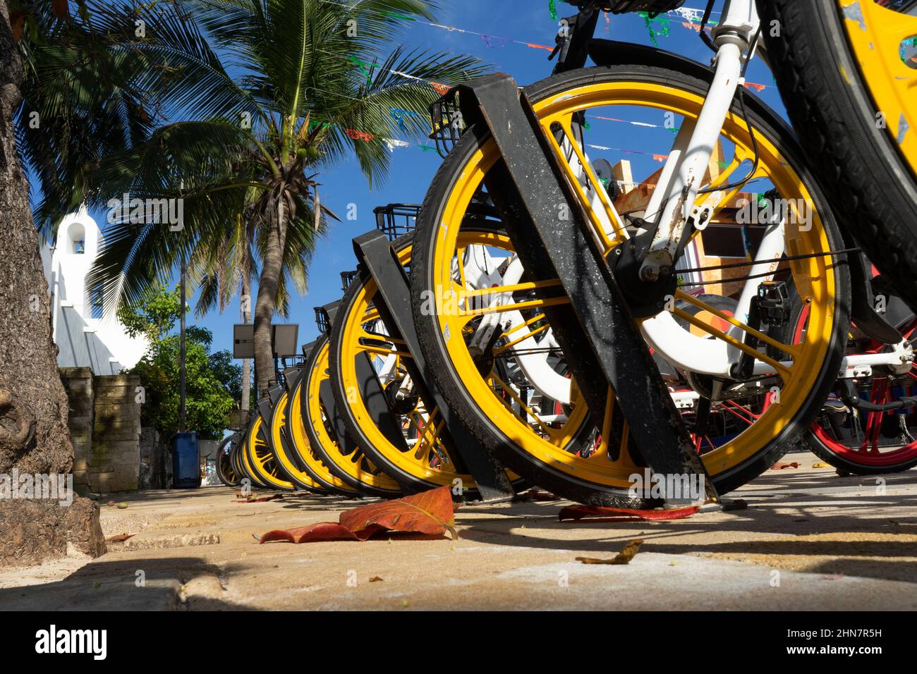 Detail of bicycle wheels for rent in a downtown parking lot in playa ...