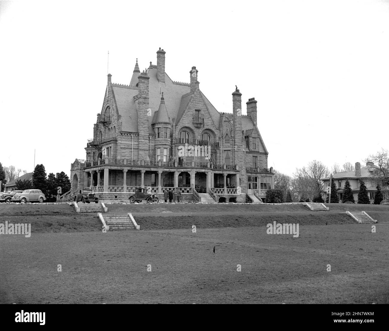 Vintage black and white photograph ca. 1943 of the Victorian-era Craigdarroch Castle, a Scottish Baronial mansion in Victoria, British Columbia, Canada Stock Photo