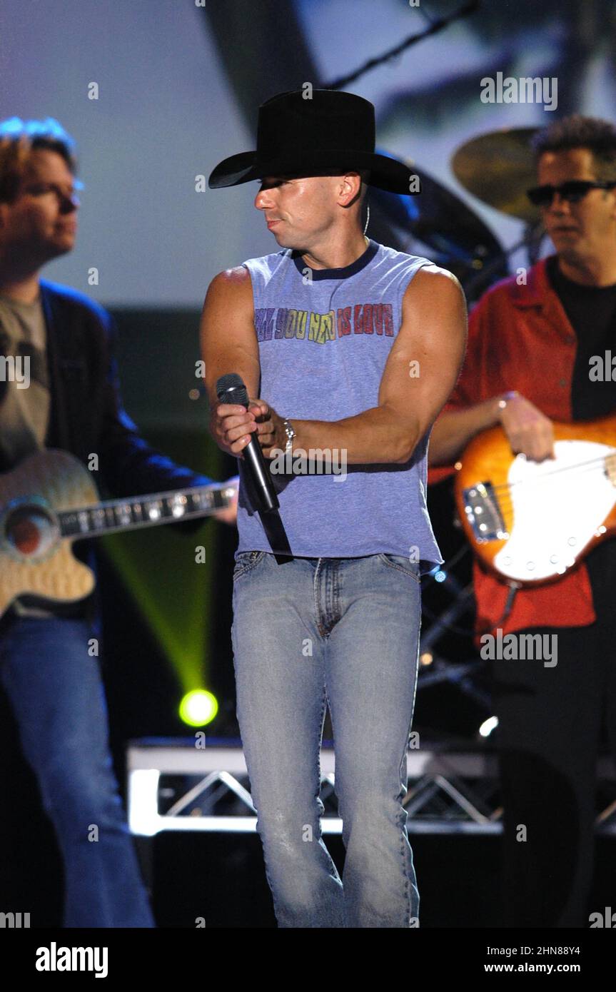 Kenny Chesney performing in 2004  Credit: Ron Wolfson / Rock Negatives / MediaPunch Stock Photo