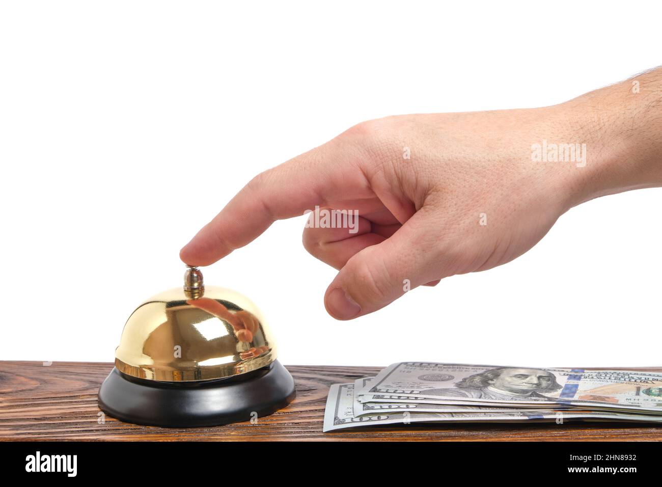 Pressing your hand bell hotel service and dollars table.Concept hotel