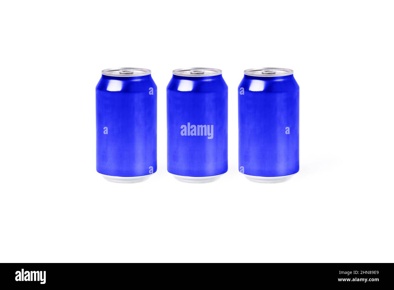 Three blue colored aluminum cans on a white background. Refreshing drink concept Stock Photo