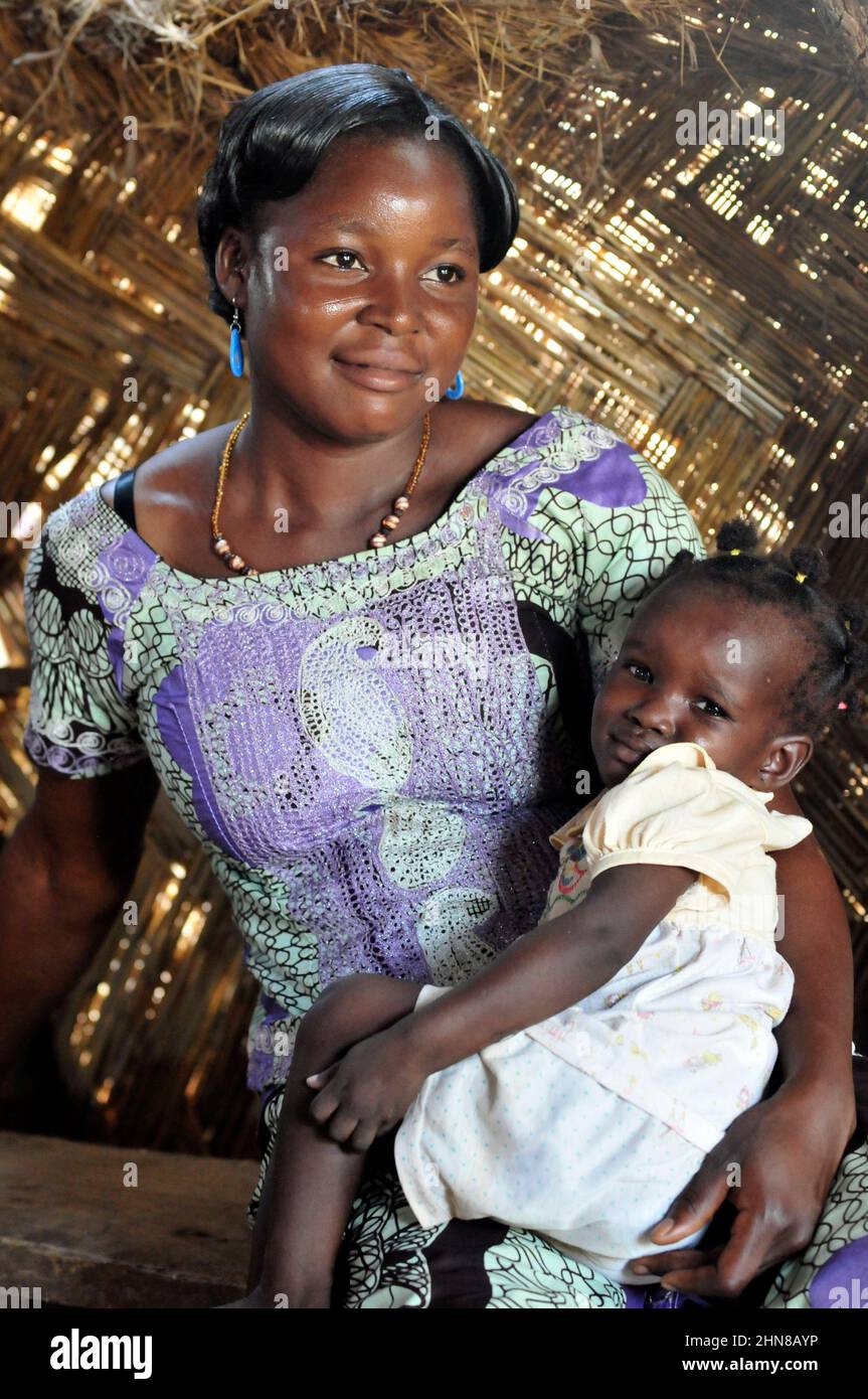 A Burkinabe woman with her little girl. Photo taken in central Burkina ...