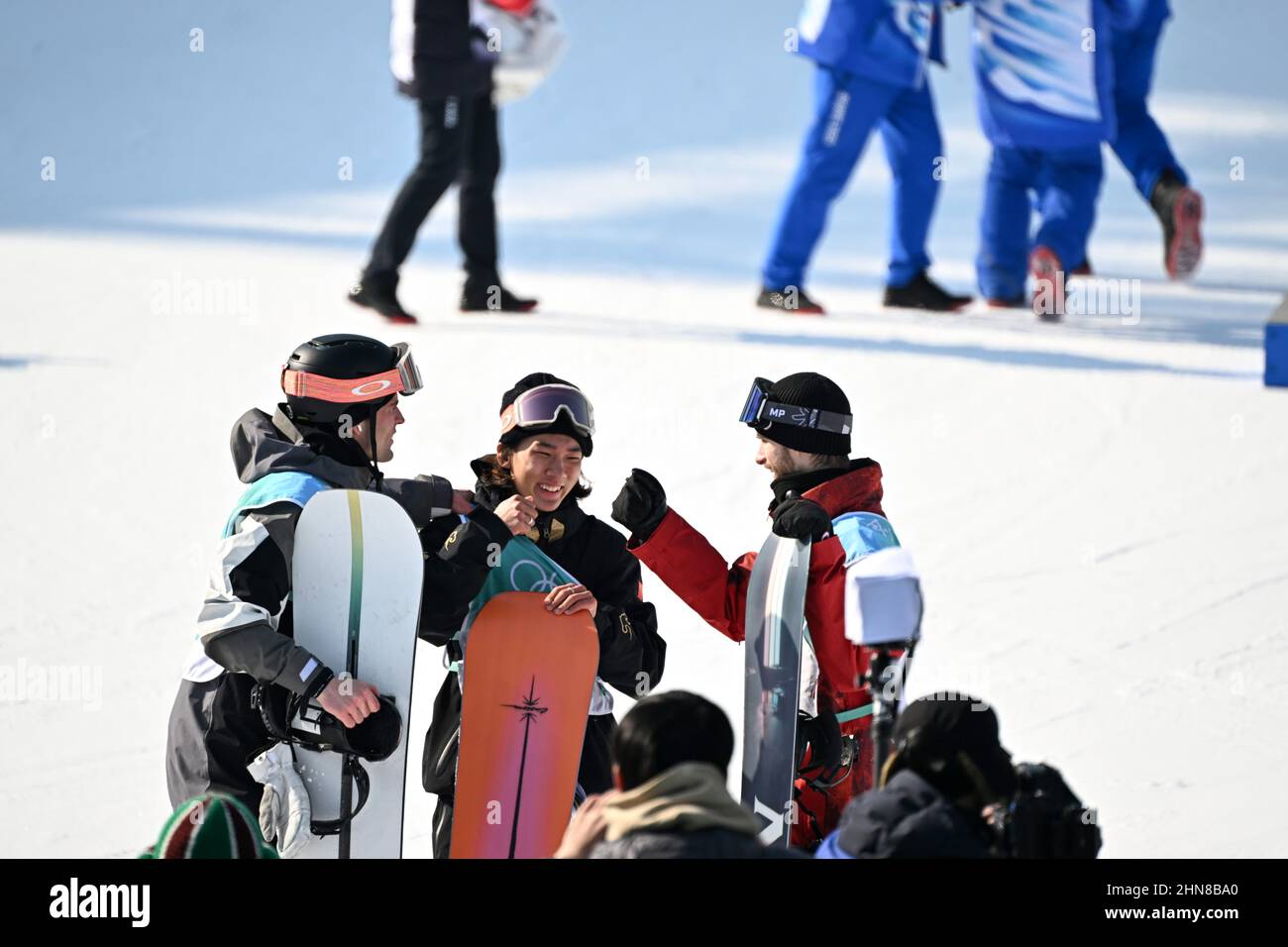 Beijing, China. 15th Feb, 2022. Mons Roisland (L) of Norway and Max Parrot (R) of Canada congratulate Su Yiming of China after the men's snowboard big air final of Beijing 2022 Winter Olympics at Big Air Shougang in Beijing, capital of China, Feb. 15, 2022. Credit: Li He/Xinhua/Alamy Live News Stock Photo