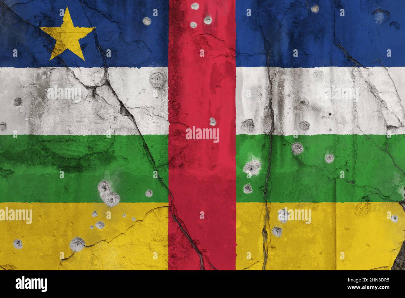 Weathered flag of Central African Republic (CAR) painted on a cracked wall with bullet holes. Central African Republic violence and crisis concept. Stock Photo