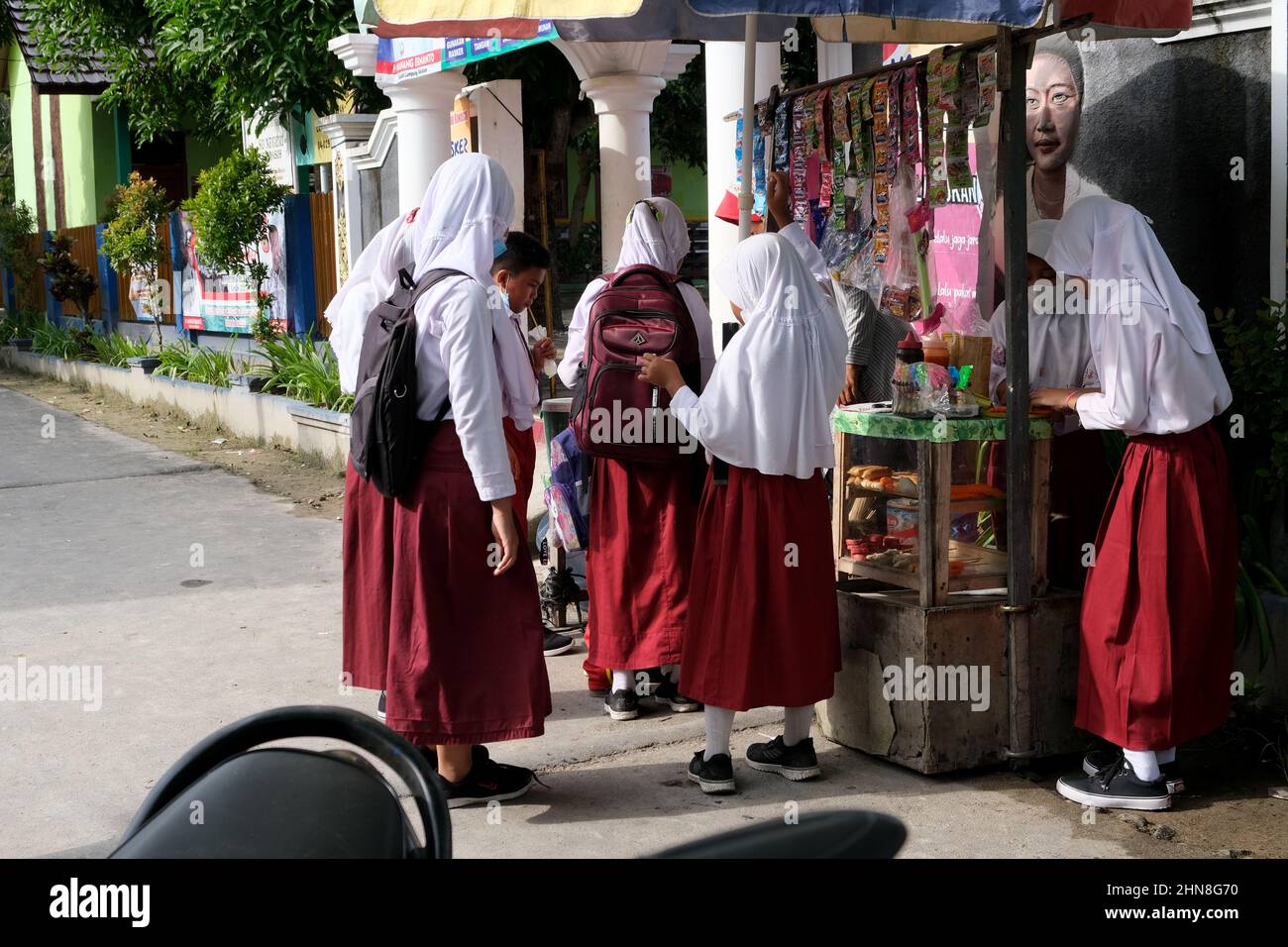 Lampung, Indonesia, December 17 2021- Elementary school children buying snacks in the canteen during break time at a public elementary school Stock Photo