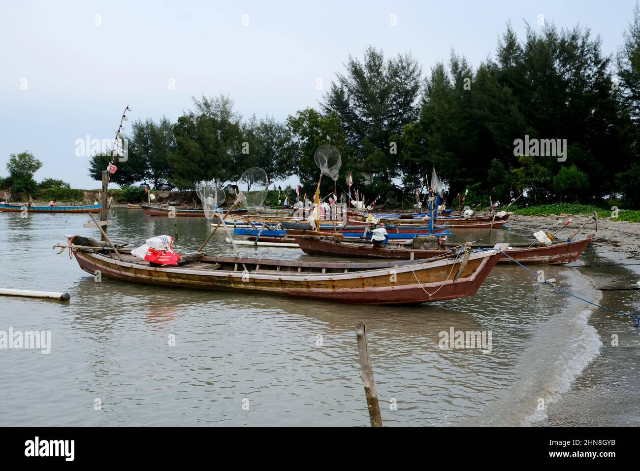 Lampung, Indonesia, February 12 2022- Defocused on Fishing boats on the beach. fishing is the livelihood of local people in Tridarmayoga village, Lamp Stock Photo