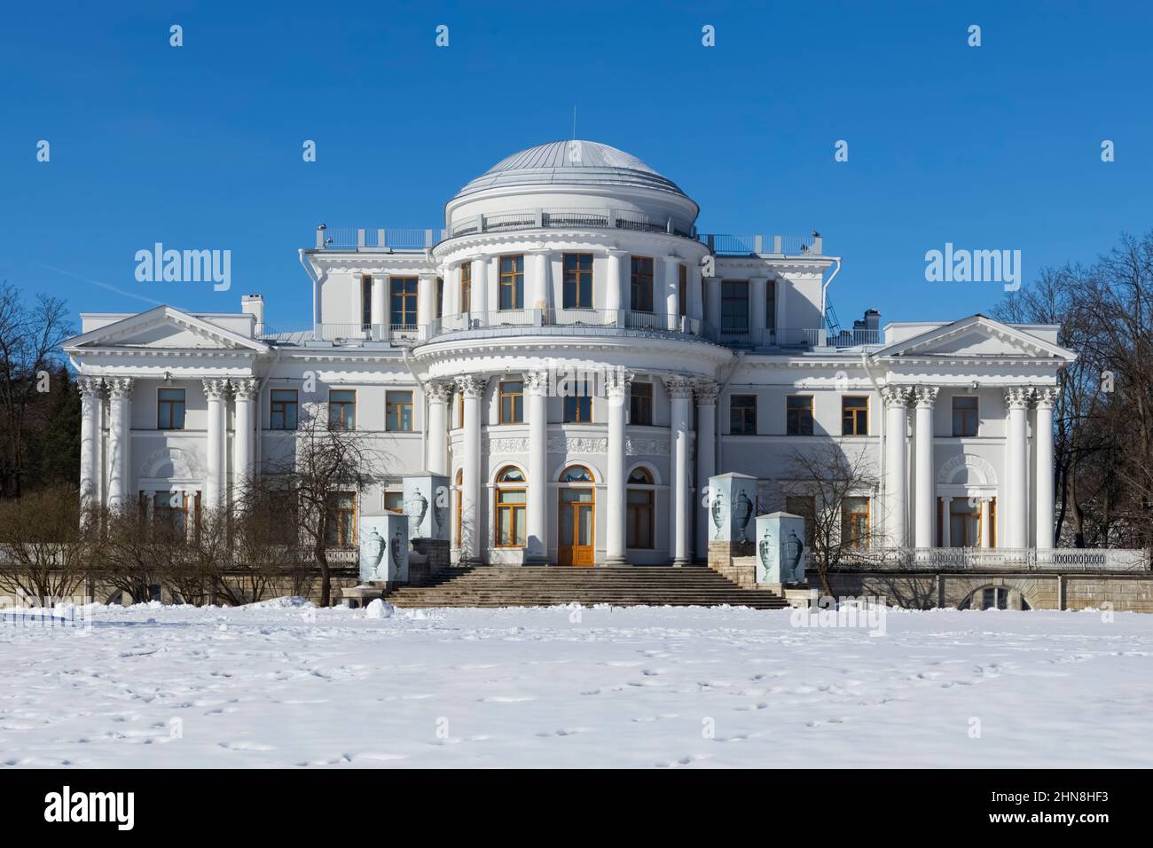 Eastern facade of the Elagin Palace with stairs in early snowy spring (St. Petersburg, Russia) Stock Photo
